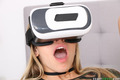 Blonde teen Khloe Kapri masturbates while wearing VR goggles