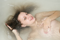 Hot teen babe takes a bath