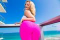 Solo girl Alexis Texas releases her huge ass from pink spandex pants