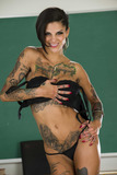 Tattoo model Bonnie Rotten wiggles her way free of clothing at teacher's desk