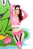 Skinny punk pornstar Sheena Rose striking hot poses in mesh outfit