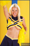 Busty cheerleader Rhylee Richards demonstrates comely boobs and booty