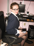 Naughty business lady plays with pussy