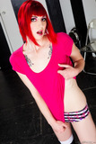 Red-haired tattooed tootsie Sally Sparrow is happy to show her skinny body
