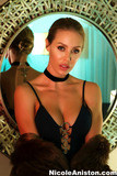 Sexy blond chick Nicole Aniston licks a mirror while admiring herself