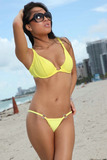 Top Asian model Asa Akira removes her sunglasses and bikini on nude beach