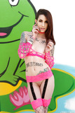 Skinny punk pornstar Sheena Rose striking hot poses in mesh outfit