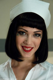 Dark haired nurse Asphyxia Noir is sexually assaulted by a male patient