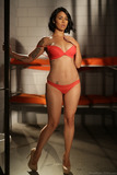 Asian lawyer Dana Vespoli strips off her clothes inside a client's jail cell