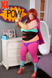 Redhead BBW Kitty McPherson strips off her cosplay outfit to pose nude