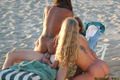 Sultry chicks have a passionate FFM threesome on the beach