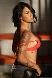 Asian lawyer Dana Vespoli strips off her clothes inside a client's jail cell